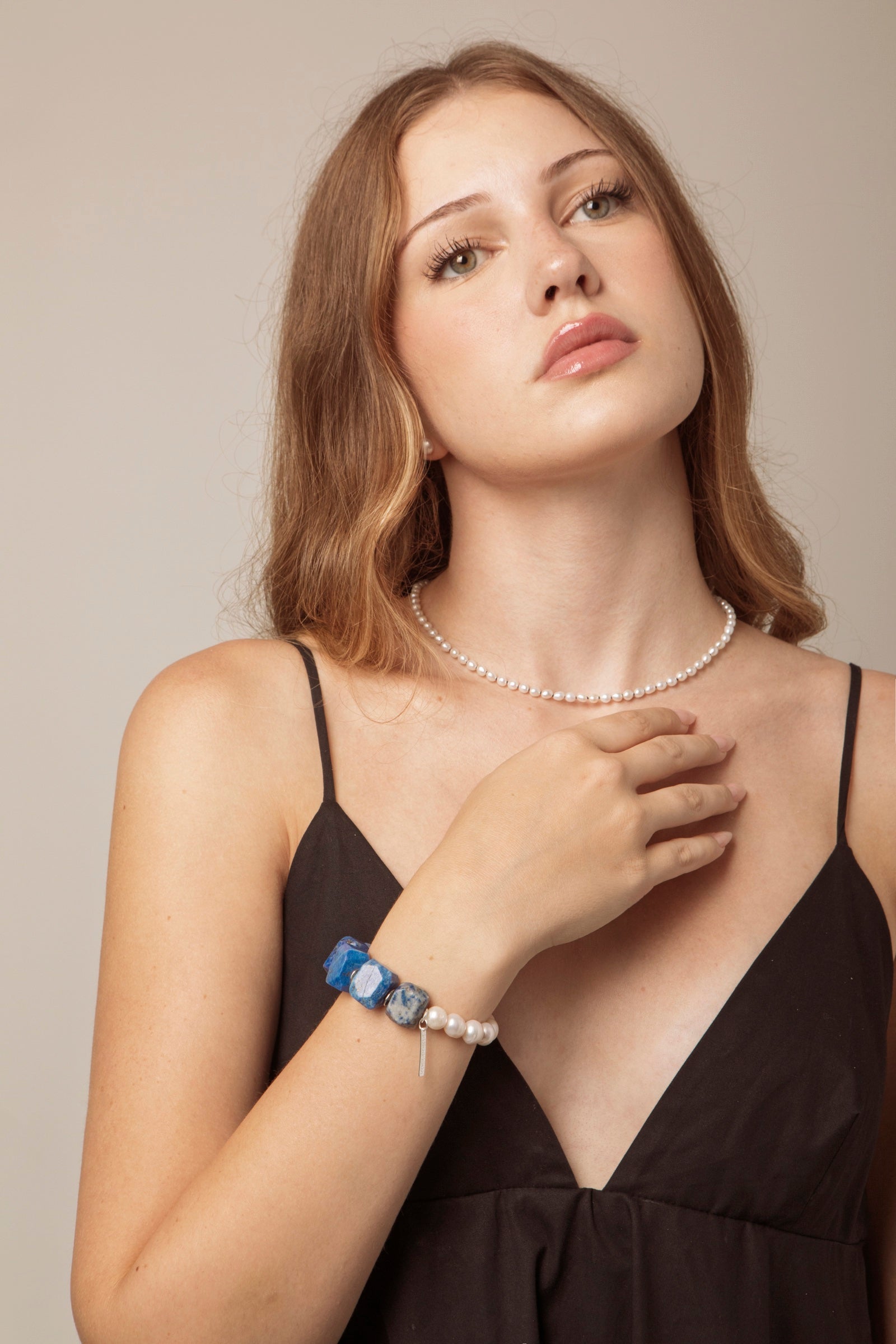 ANGKI jewellery worn by a model